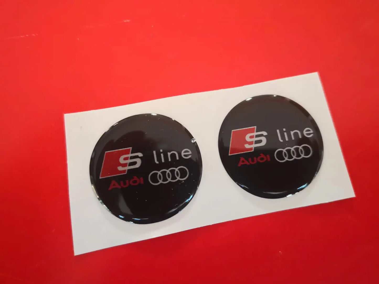 Adesivo Resinato 3D Audi Sline 1/3/5/7/10 cm sfondo nero logo grigio